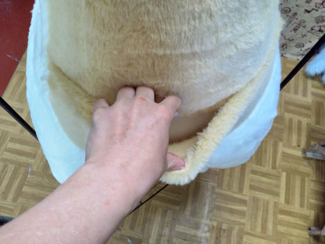 A wraparound shot of a fully-furred bodysuit
