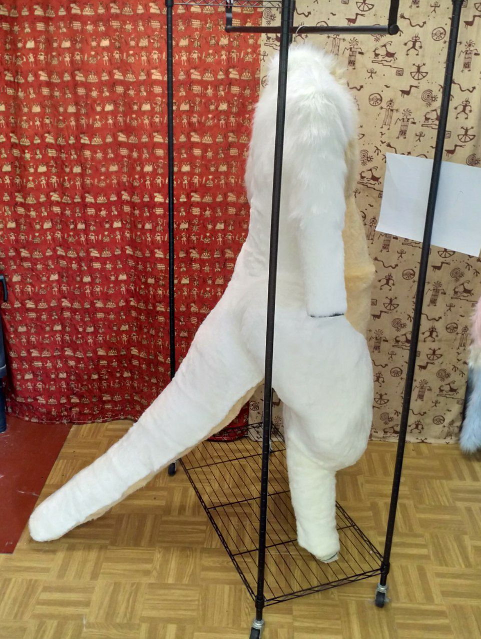 A wraparound shot of a fully-furred bodysuit